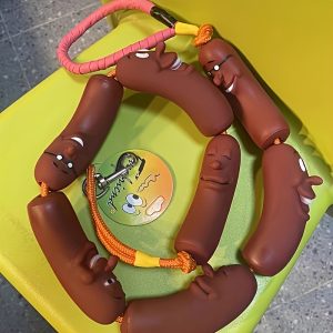 Fun sausage-shaped dog leash suitable for small to medium-sized dogs. Cartoon design, durable rubber hand-held lead - unique and interesting design, perfect for dog owners. Ideal for walks and outdoor adventures. A fun gift for dog lovers.